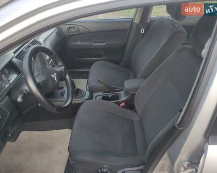 Серый Мицубиси Лансер, объемом двигателя 1.6 л и пробегом 223 тыс. км за 3300 $, фото 2 на Automoto.ua