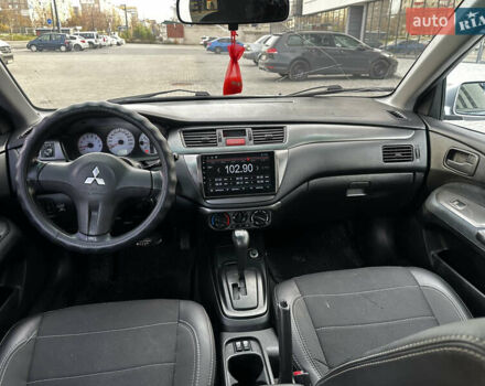 Серый Мицубиси Лансер, объемом двигателя 1.6 л и пробегом 200 тыс. км за 3900 $, фото 9 на Automoto.ua