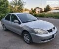 Сірий Міцубісі Lancer, об'ємом двигуна 1.3 л та пробігом 175 тис. км за 4350 $, фото 1 на Automoto.ua