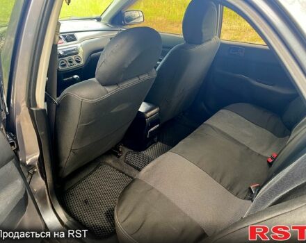 Серый Мицубиси Лансер, объемом двигателя 1.6 л и пробегом 212 тыс. км за 4600 $, фото 6 на Automoto.ua