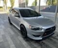 Сірий Міцубісі Lancer, об'ємом двигуна 2 л та пробігом 244 тис. км за 7500 $, фото 1 на Automoto.ua