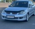 Сірий Міцубісі Lancer, об'ємом двигуна 2 л та пробігом 166 тис. км за 5300 $, фото 1 на Automoto.ua