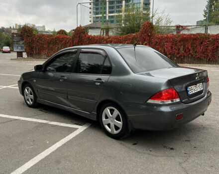 Сірий Міцубісі Lancer, об'ємом двигуна 1.58 л та пробігом 176 тис. км за 4700 $, фото 4 на Automoto.ua