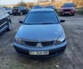 Сірий Міцубісі Lancer, об'ємом двигуна 2 л та пробігом 95 тис. км за 3000 $, фото 1 на Automoto.ua