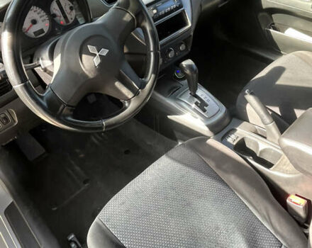 Сірий Міцубісі Lancer, об'ємом двигуна 1.58 л та пробігом 212 тис. км за 5600 $, фото 4 на Automoto.ua