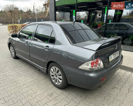 Сірий Міцубісі Lancer, об'ємом двигуна 1.6 л та пробігом 115 тис. км за 2800 $, фото 2 на Automoto.ua