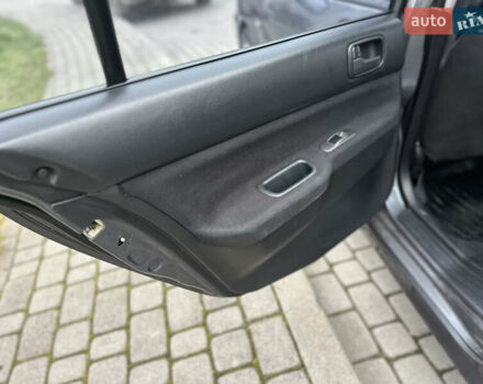 Сірий Міцубісі Lancer, об'ємом двигуна 1.6 л та пробігом 177 тис. км за 2800 $, фото 26 на Automoto.ua