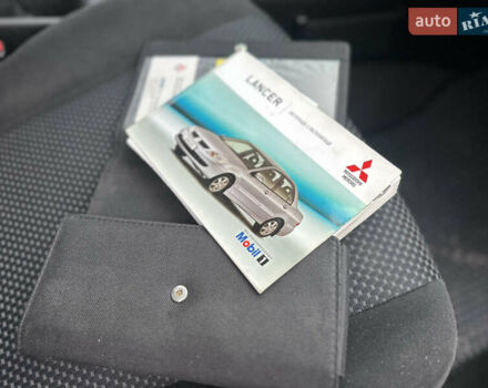 Сірий Міцубісі Lancer, об'ємом двигуна 1.6 л та пробігом 177 тис. км за 2800 $, фото 36 на Automoto.ua