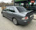 Сірий Міцубісі Lancer, об'ємом двигуна 1.6 л та пробігом 115 тис. км за 2800 $, фото 2 на Automoto.ua