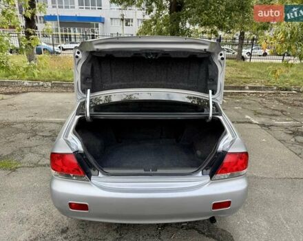Сірий Міцубісі Lancer, об'ємом двигуна 1.58 л та пробігом 138 тис. км за 4990 $, фото 33 на Automoto.ua