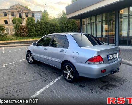 Сірий Міцубісі Lancer, об'ємом двигуна 1.6 л та пробігом 193 тис. км за 3999 $, фото 4 на Automoto.ua