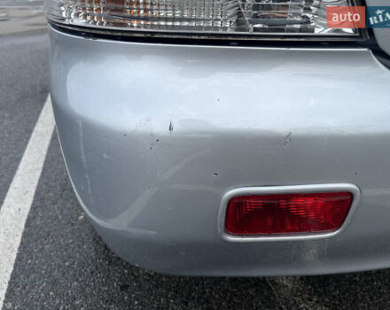 Серый Мицубиси Лансер, объемом двигателя 1.58 л и пробегом 232 тыс. км за 4900 $, фото 12 на Automoto.ua