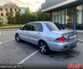 Сірий Міцубісі Lancer, об'ємом двигуна 1.6 л та пробігом 193 тис. км за 3999 $, фото 4 на Automoto.ua