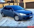 Серый Мицубиси Лансер, объемом двигателя 1.6 л и пробегом 23900 тыс. км за 4500 $, фото 1 на Automoto.ua