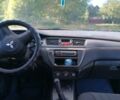 Серый Мицубиси Лансер, объемом двигателя 1.58 л и пробегом 300 тыс. км за 4400 $, фото 6 на Automoto.ua