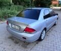 Сірий Міцубісі Lancer, об'ємом двигуна 1.6 л та пробігом 258 тис. км за 3350 $, фото 1 на Automoto.ua