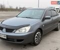 Сірий Міцубісі Lancer, об'ємом двигуна 1.6 л та пробігом 270 тис. км за 4300 $, фото 3 на Automoto.ua