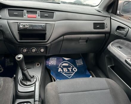 Серый Мицубиси Лансер, объемом двигателя 1.6 л и пробегом 280 тыс. км за 4600 $, фото 4 на Automoto.ua