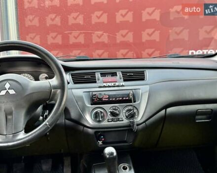 Сірий Міцубісі Lancer, об'ємом двигуна 1.6 л та пробігом 395 тис. км за 4900 $, фото 20 на Automoto.ua