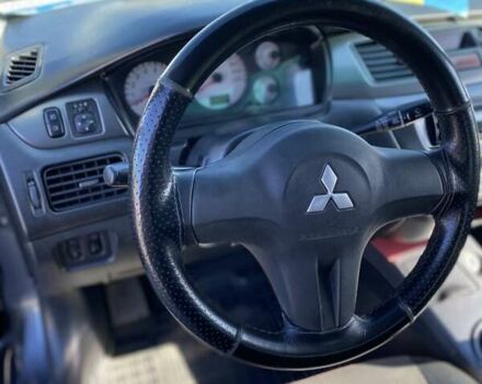Сірий Міцубісі Lancer, об'ємом двигуна 1.6 л та пробігом 293 тис. км за 5000 $, фото 9 на Automoto.ua