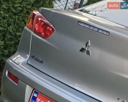 Серый Мицубиси Лансер, объемом двигателя 2 л и пробегом 282 тыс. км за 5450 $, фото 39 на Automoto.ua