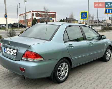 Сірий Міцубісі Lancer, об'ємом двигуна 1.6 л та пробігом 116 тис. км за 5199 $, фото 10 на Automoto.ua