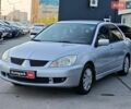 Сірий Міцубісі Lancer, об'ємом двигуна 1.6 л та пробігом 198 тис. км за 4700 $, фото 1 на Automoto.ua