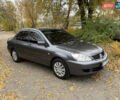 Сірий Міцубісі Lancer, об'ємом двигуна 1.58 л та пробігом 247 тис. км за 4900 $, фото 3 на Automoto.ua