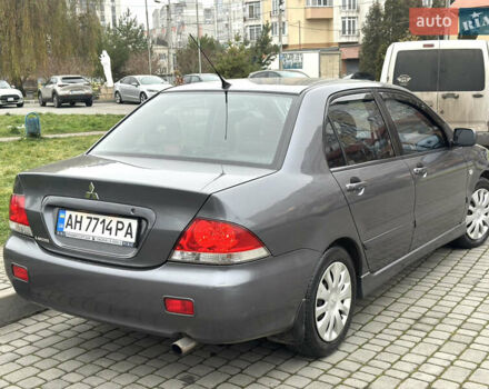 Сірий Міцубісі Lancer, об'ємом двигуна 1.6 л та пробігом 177 тис. км за 2800 $, фото 6 на Automoto.ua