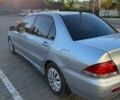 Сірий Міцубісі Lancer, об'ємом двигуна 1.6 л та пробігом 174 тис. км за 4800 $, фото 1 на Automoto.ua