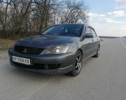 Сірий Міцубісі Lancer, об'ємом двигуна 2 л та пробігом 155 тис. км за 5000 $, фото 4 на Automoto.ua