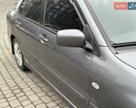 Сірий Міцубісі Lancer, об'ємом двигуна 1.6 л та пробігом 177 тис. км за 2800 $, фото 13 на Automoto.ua