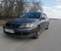 Сірий Міцубісі Lancer, об'ємом двигуна 2 л та пробігом 155 тис. км за 5000 $, фото 4 на Automoto.ua