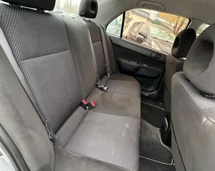 Серый Мицубиси Лансер, объемом двигателя 1.6 л и пробегом 280 тыс. км за 4600 $, фото 2 на Automoto.ua