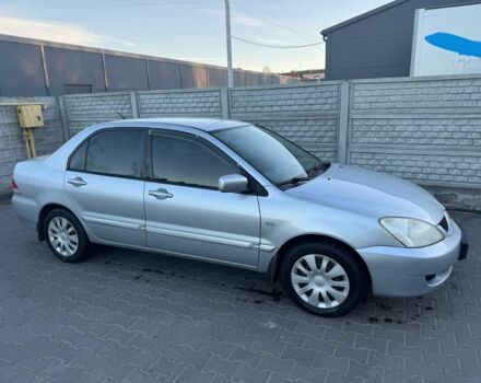 Серый Мицубиси Лансер, объемом двигателя 1.6 л и пробегом 256 тыс. км за 4500 $, фото 1 на Automoto.ua