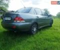 Сірий Міцубісі Lancer, об'ємом двигуна 1.58 л та пробігом 220 тис. км за 4500 $, фото 5 на Automoto.ua
