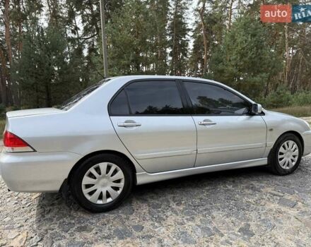 Серый Мицубиси Лансер, объемом двигателя 1.6 л и пробегом 200 тыс. км за 4400 $, фото 7 на Automoto.ua