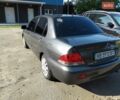 Серый Мицубиси Лансер, объемом двигателя 1.6 л и пробегом 189 тыс. км за 3999 $, фото 1 на Automoto.ua