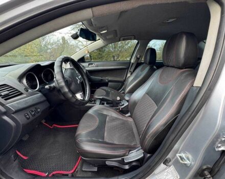 Серый Мицубиси Лансер, объемом двигателя 2 л и пробегом 207 тыс. км за 5800 $, фото 12 на Automoto.ua