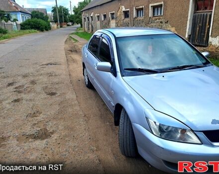 Сірий Міцубісі Lancer, об'ємом двигуна 1.6 л та пробігом 348 тис. км за 4150 $, фото 2 на Automoto.ua