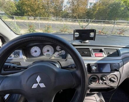 Серый Мицубиси Лансер, объемом двигателя 1.6 л и пробегом 161 тыс. км за 4800 $, фото 4 на Automoto.ua