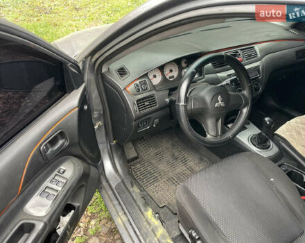 Сірий Міцубісі Lancer, об'ємом двигуна 1.58 л та пробігом 290 тис. км за 3500 $, фото 3 на Automoto.ua