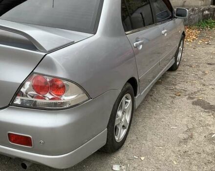 Серый Мицубиси Лансер, объемом двигателя 1.6 л и пробегом 196 тыс. км за 3800 $, фото 1 на Automoto.ua