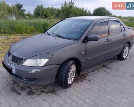 Мицубиси Лансер 2007 в Ивано-Франковске на Automoto.ua Серый Мицубиси Лансер, объемом двигателя 1.58 л и пробегом 238 тыс. км за 2950 $, фото 9 на Automoto.ua