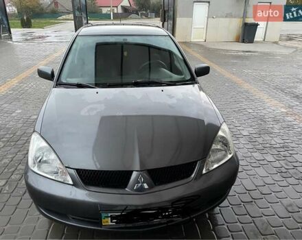 Сірий Міцубісі Lancer, об'ємом двигуна 1.6 л та пробігом 330 тис. км за 3500 $, фото 21 на Automoto.ua