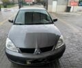 Сірий Міцубісі Lancer, об'ємом двигуна 1.6 л та пробігом 330 тис. км за 3500 $, фото 21 на Automoto.ua