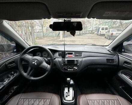 Серый Мицубиси Лансер, объемом двигателя 1.6 л и пробегом 238 тыс. км за 4300 $, фото 2 на Automoto.ua