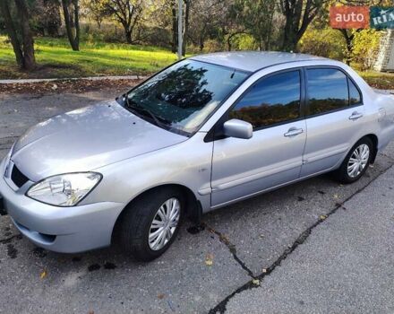 Сірий Міцубісі Lancer, об'ємом двигуна 1.58 л та пробігом 122 тис. км за 6300 $, фото 24 на Automoto.ua