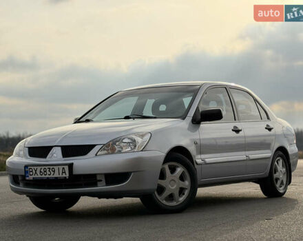 Серый Мицубиси Лансер, объемом двигателя 1.3 л и пробегом 160 тыс. км за 5555 $, фото 1 на Automoto.ua