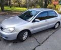 Сірий Міцубісі Lancer, об'ємом двигуна 1.58 л та пробігом 122 тис. км за 6300 $, фото 24 на Automoto.ua